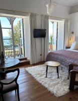 Habitación Doble Deluxe con balcón y vistas al mar
