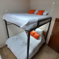 Camera Familiare con Bagno in Comune