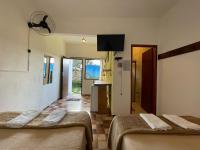 Camera Familiare con Vista Giardino