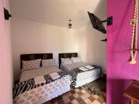 Camera Familiare con Vista Giardino