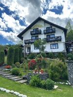 Casa de pe Deal Bran - Ferienwohnung Șimon