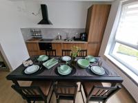 Miejski Las Apartament z 2 sypialniami ,garażem i tarasem - Chambres d’hôtes Kołobrzeg