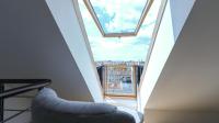 Großes Maisonette-Apartment mit 1 Schlafzimmer und Gemeinschaftsterrasse