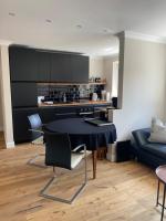 One-Bedroom Apartment with Balcony and City View
