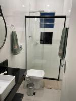 Apartamento novo com garagem e ar condicionado - B&B São Lourenço