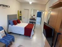 Apartamento novo com garagem e ar condicionado - Chambres d’hôtes São Lourenço