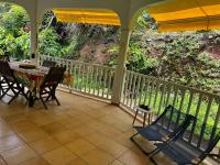 Studio La Marguerite - Vue mer avec terrasse privée - calme tropical à Deshaies - Ferienwohnung Deshaies