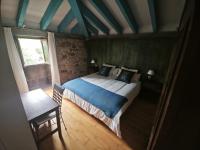 Kamer met Kingsize Bed en Uitzicht op de Bergen