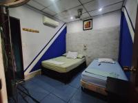 Camera Doppia con Letti Singoli