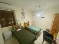 Camera Doppia con Letti Singoli con Doccia