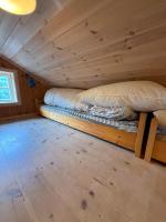 Beautiful Fjord Cabin near Bergen with Boat and Private Garden - Chambres d'hôtes Litangen
