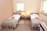Tweepersoonskamer met 2 Aparte Bedden en Bad