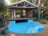 African Paradise - Garden Glamping - Outdoor Shower - Bed and Breakfast Benoni