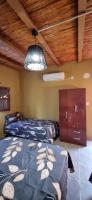 Chambre Triple avec Salle de Bains Privative