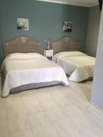 Kamer met 2 Queensize Bedden