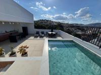 Studio lindo com ar condicionado e piscina - Bela Vita - 309 - B&B São Lourenço