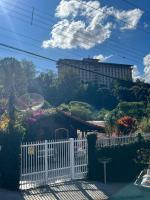 Casa de Madeira Aconchego - Ótima localização - Chambres d’hôtes Águas de Lindóia