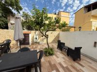 Casa Vacanza con cucina in giardino e parcheggio - Bed and Breakfast Alghero