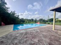 Maison mitoyenne cosy avec piscine - Bed and Breakfast Baie-Mahault