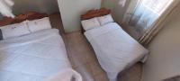 Standaard Kamer met 2 Queensize Bedden