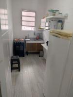 Kitnet aconchegante no centro, a poucos passos da praia - Chambres d’hôtes Praia Grande