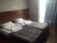 Tweepersoonskamer met 2 Aparte Bedden