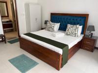 Chambre Double Deluxe (2 Adultes + 1 Enfant)