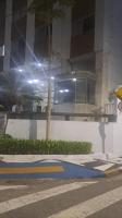 Apto a 25 metros areia PITANGUEIRAS Vista mar 4 quartos 3 banheiros 1 vaga carro Serviço de praia - Chambres d’hôtes Guarujá
