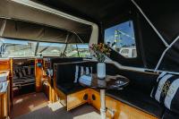 Boat with private pedal boat and SUP boards