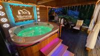 Villa Fortuna - Regionalne apartamenty & SPA - Sauna, Grill, Jacuzzi z widokiem na Tatry - Chambres d'hôtes Zakopane
