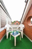 Ferienwohnung Sonnenstrahl - Ferienwohnung Esens