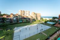 Amplio apartamento familiar con piscina y vistas al mar en Benicàssim - Chambres d'hôtes Benicàssim