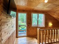 За рікою - Chambres d’hôtes Tatariv