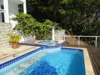 Casa Cinematográfica de frente pro mar FEITICEIRA - Chambres d'hôtes Ilhabela