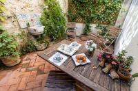 Secret Garden Apt Colosseo - Homkeey Apartments - Chambres d’hôtes Rome