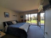 Kamer met Queensize Bed en Uitzicht op Zee