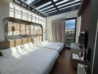 Deluxe Quadruple Room with Balcony