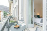 Central & White Apartment by Rent All Como - Chambres d’hôtes Côme