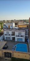 Villa golden life apartments, new property with pool access - Bed and Breakfast Luxor