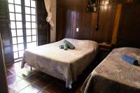 Dreibettzimmer mit Gartenblick