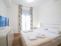 Three-Bedroom Apartment with Balcony and Sea View