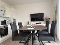Ostfrieslands Perle Ferienwohnung an der Nordseeküste, Sauna, Terrasse, Garten, ruhige Lage, WLAN - Ferienwohnung Norden