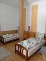 Camera Piccola Doppia con Letti Singoli