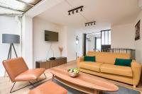 Superbe loft avec patio - Tour Eiffel - B&B París
