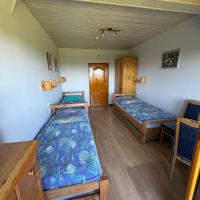 Chambre Triple – Vue sur Montagne