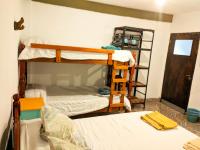 Chambre Quadruple Économique avec Salle de Bains Commune