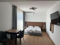 Chambre Double Deluxe (2 Adultes + 1 Enfant)