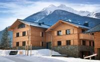 AlpinPark Chalet mit Swimmingpool, Sonnenloggia und Kamin - Großglockner Resort Matrei - B&B Matrei in Osttirol