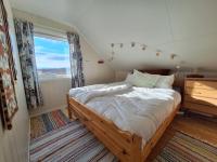 Zimmer mit Queensize-Bett und Meerblick