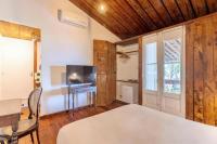 Zimmer mit Queensize-Bett und Balkon